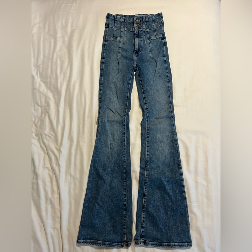 Free people darker wash high waisted jeans